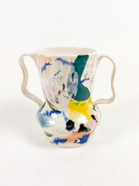 Colorful handbuilt ceramic vessel with handles