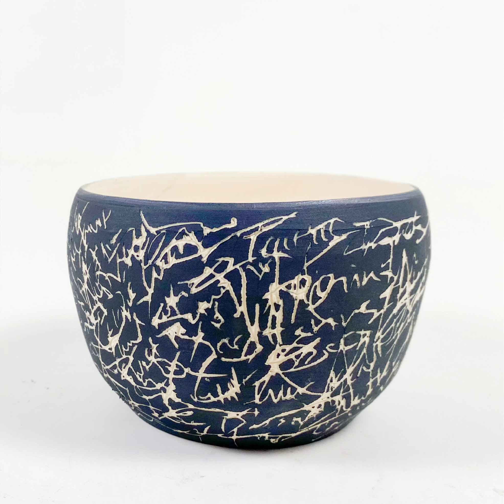 Black and white sgraffito ceramic bowl